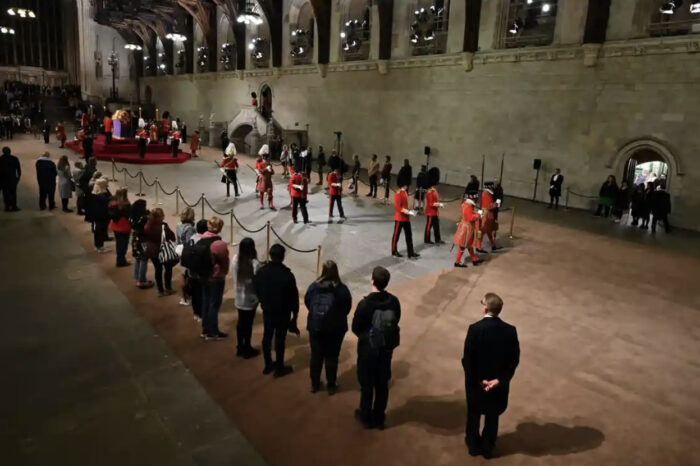 Thousands queue outside the Westminster Hall to file past the Queen’s coffin