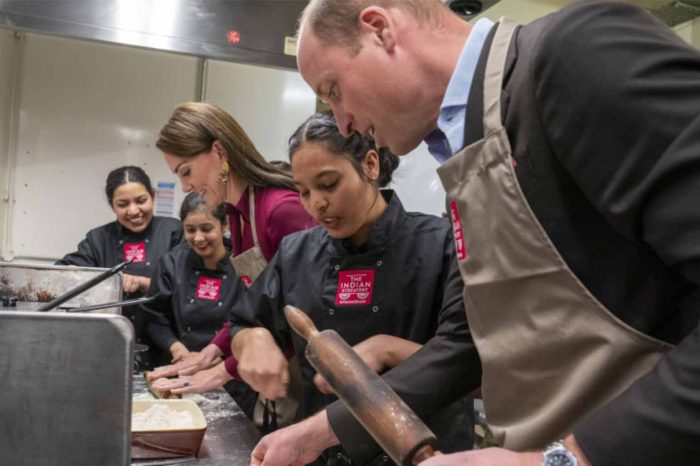 The Prince and Princess of Wales visit an Indian restaurant during their visit to Birmingham