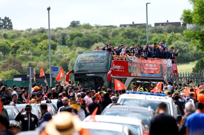 Luton Town fans celebrate the club’s historic promotion to the Premier League