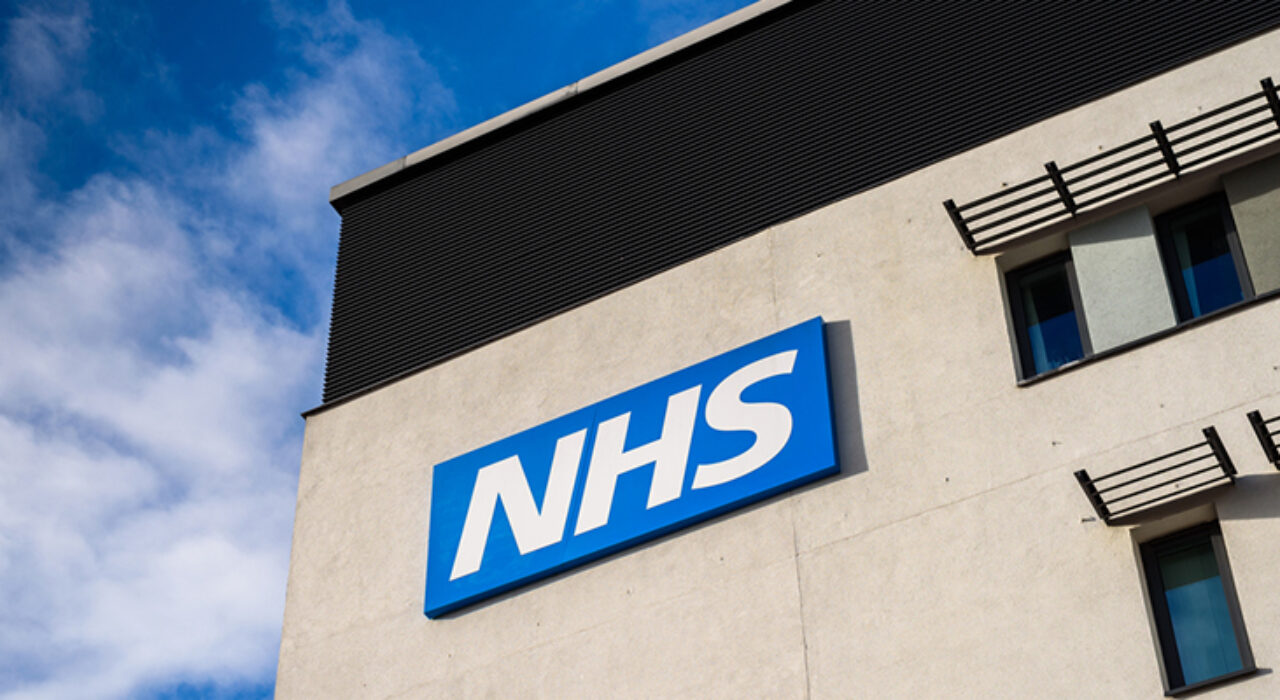 Warrington, United Kingdom - March 6, 2016: Warrington, UK - march 6, 2016: View of the NHS (National Health Service)  logo at the Springfields Medical Centre in the centre of Warrington, Cheshire.