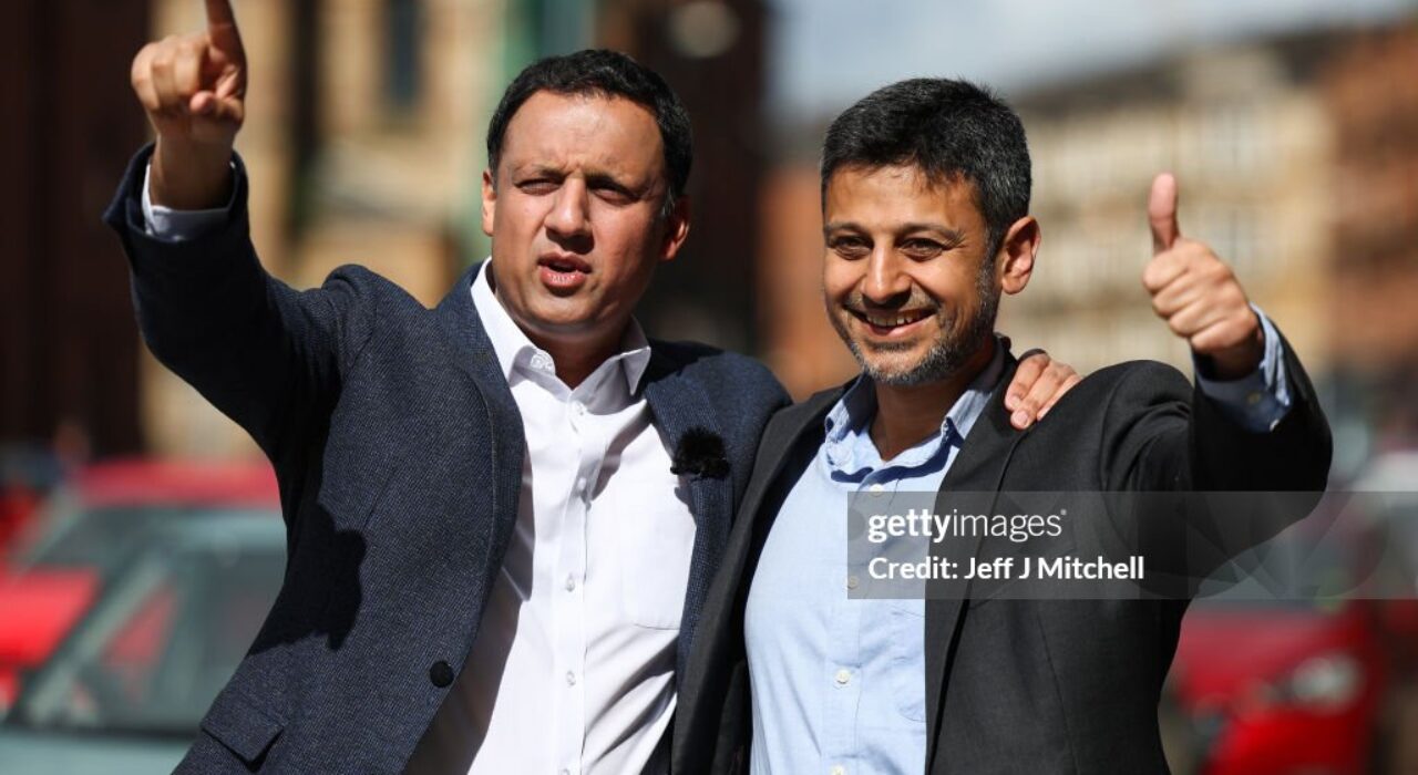 GLASGOW, SCOTLAND - JUNE 03: Scottish Labour leader Anas Sarwar visits a community food pantry in Pearce Institute with Scottish Labour candidate Zubir Ahmed on June 03, 2024 in Glasgow, Scotland. The Leader of the Scottish Labour Party is campaigning ahead of the upcoming General Election on July 4th. (Photo by Jeff J Mitchell/Getty Images)