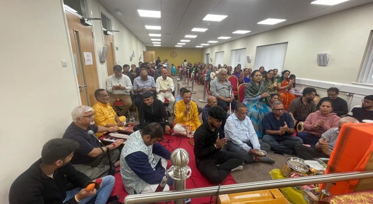 3 A Over 200 people gather at a Hindu temple to pray for peace in Leicester